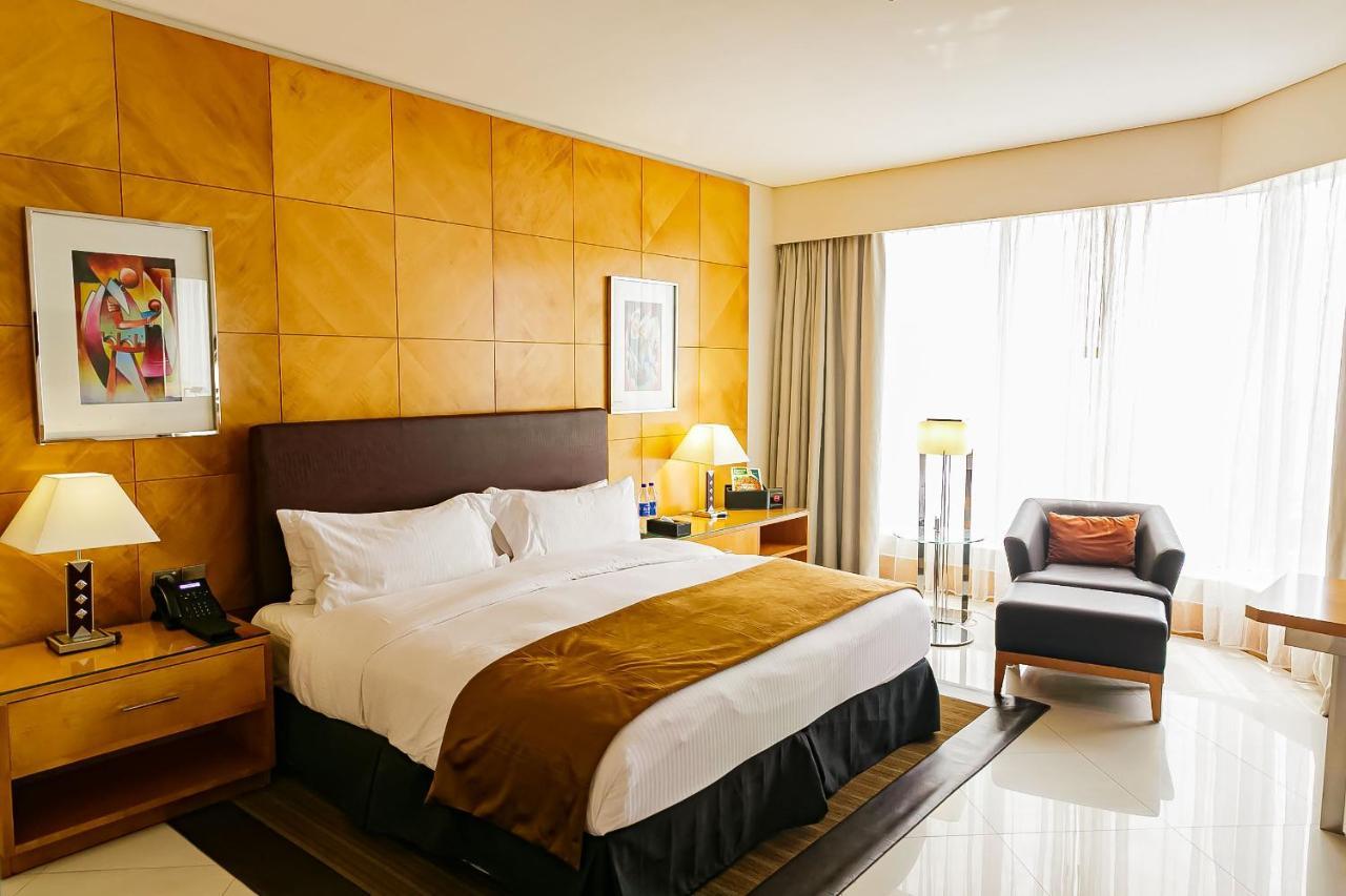Lagos Continental Hotel Exterior foto A bedroom at the hotel