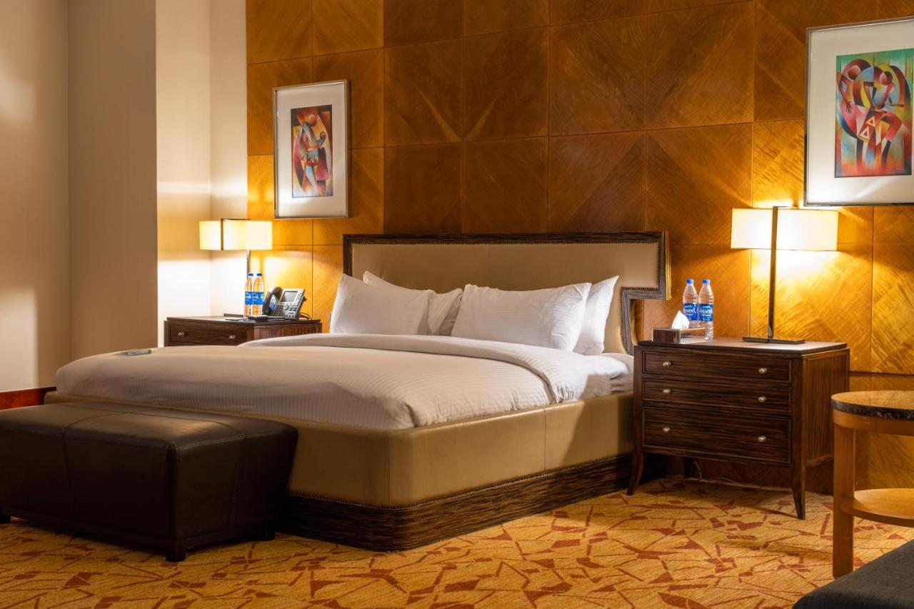 Lagos Continental Hotel Exterior foto A bedroom at the Fairmont